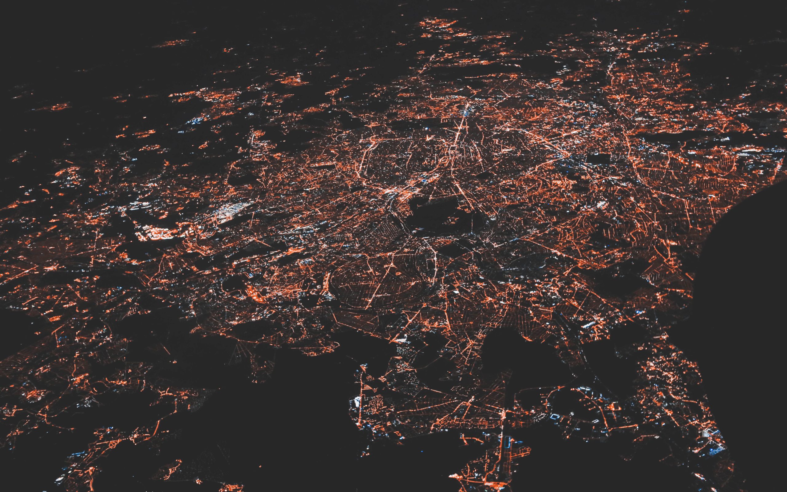 City skyline at night representing cloud and network solutions